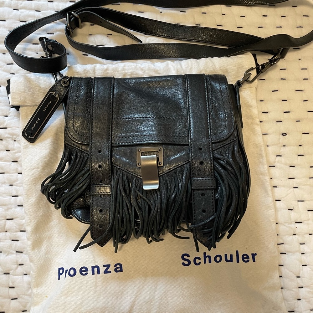 Proenza Schouler black leather small shoulder bag with fringe.